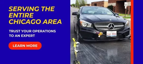 Car secured on a tow truck for vehicle towing and emergency towing in Chicago, Illinois