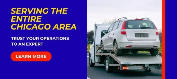 Flatbed tow truck transporting a car for emergency towing service near Chicago, Illinois